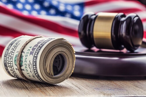 US charges 18 people, companies for crypto fraud