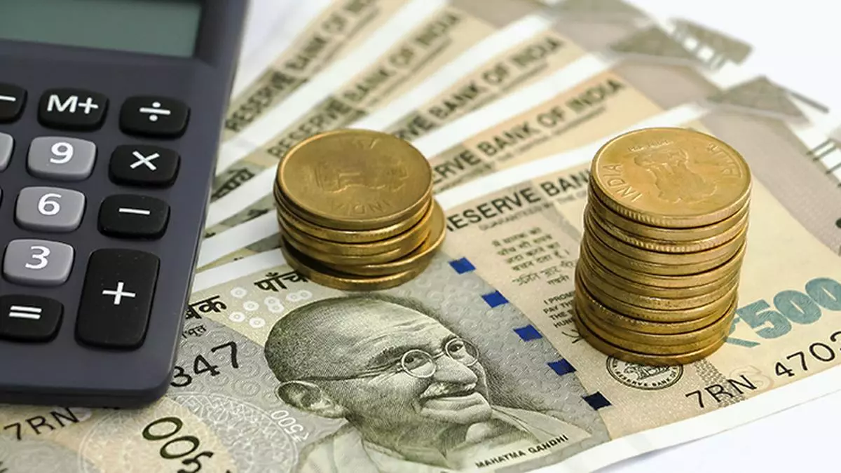 Rupee falls to record low amid outflows from stocks, bonds